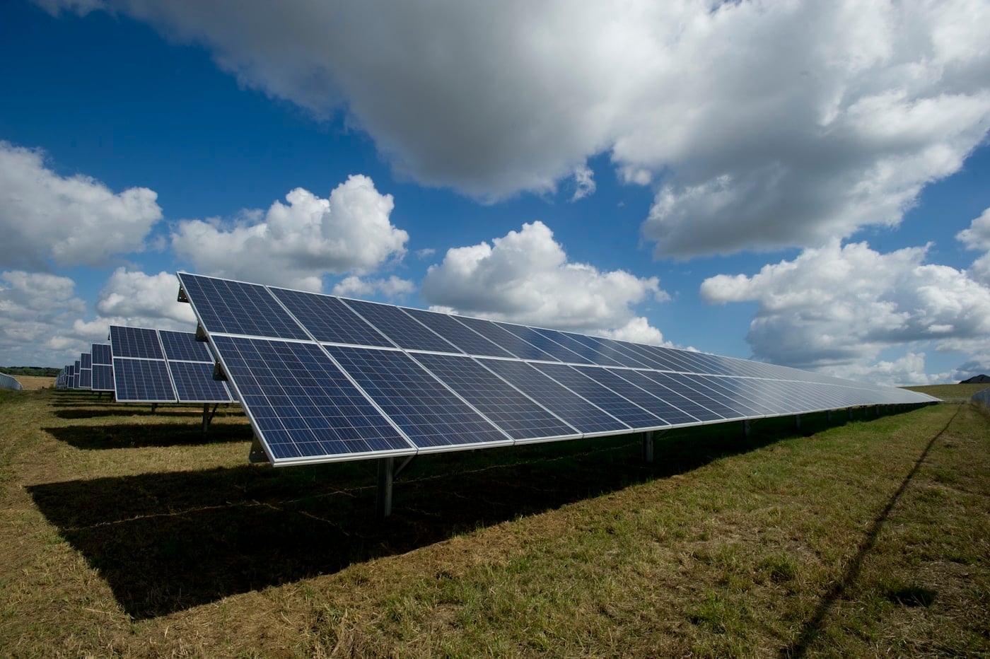 Solar panels capturing sunlight in an open landscape